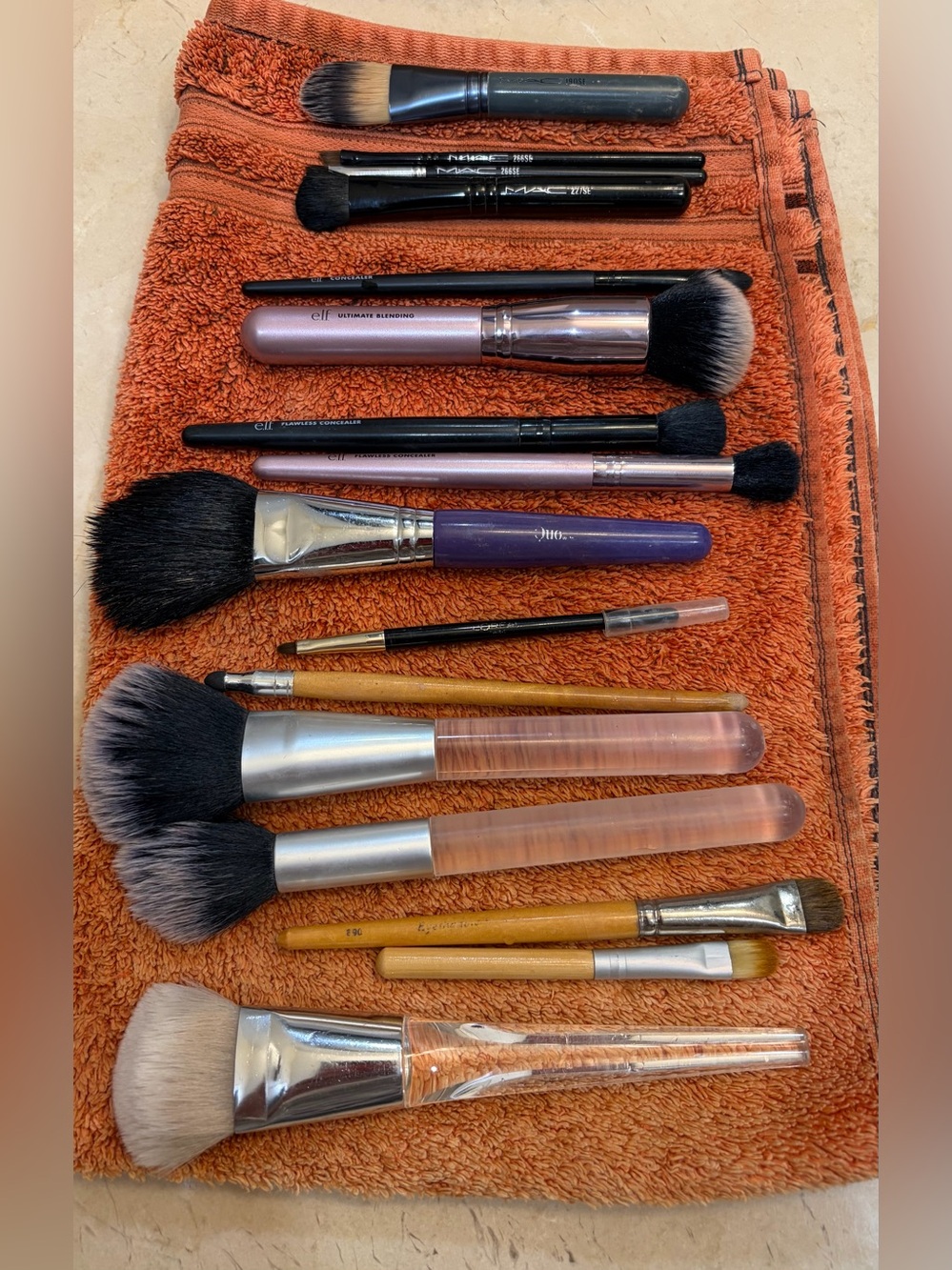 Various Make up brushes, including 4 MAC brushes.